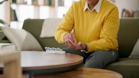 senior taking medication at home