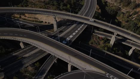 Moving-forward-over-the-roads-with-passing-cars-on-a-quiet-evening,-Haifa-Israel