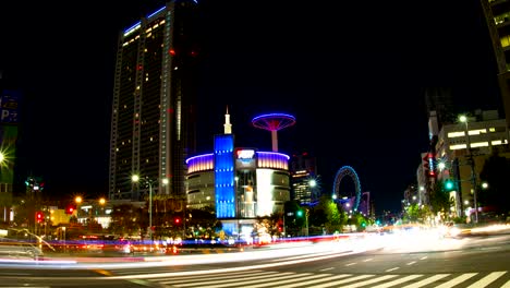 el lapso nocturno 4k cerca de la cúpula de tokyo amplia zoom en