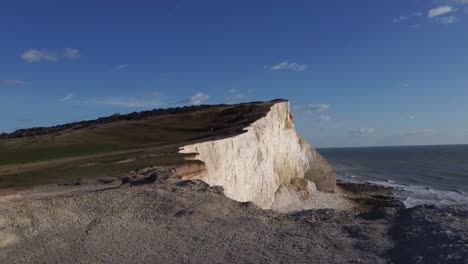 drone reveal shot of white cliffs on the south coast of england