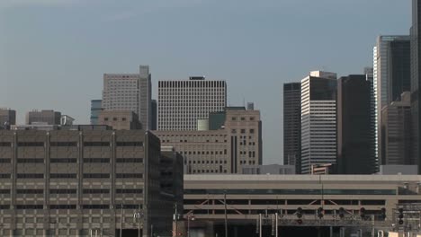 a panoramic look at the chicago skyline that includes both new and vintage buildings of various elevations