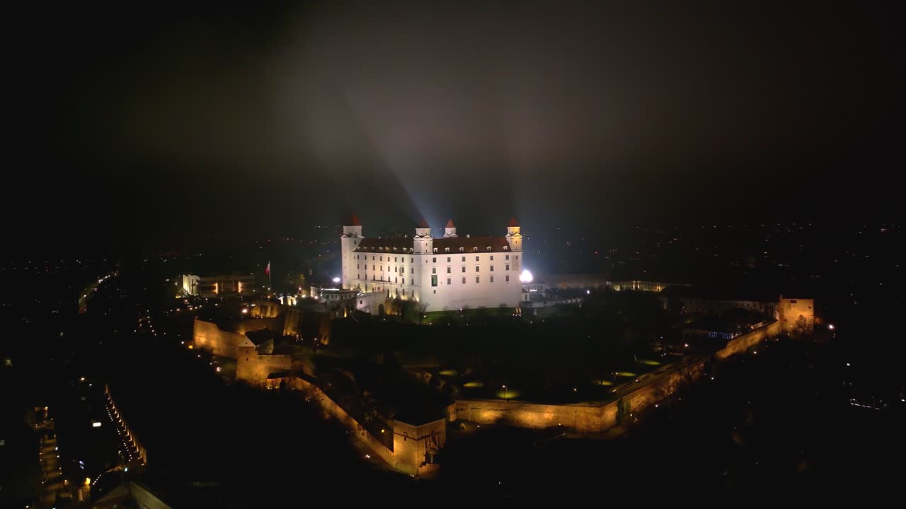 4K cinematic drone shot of Bratislava Castle illuminated at night — Slovakia_044