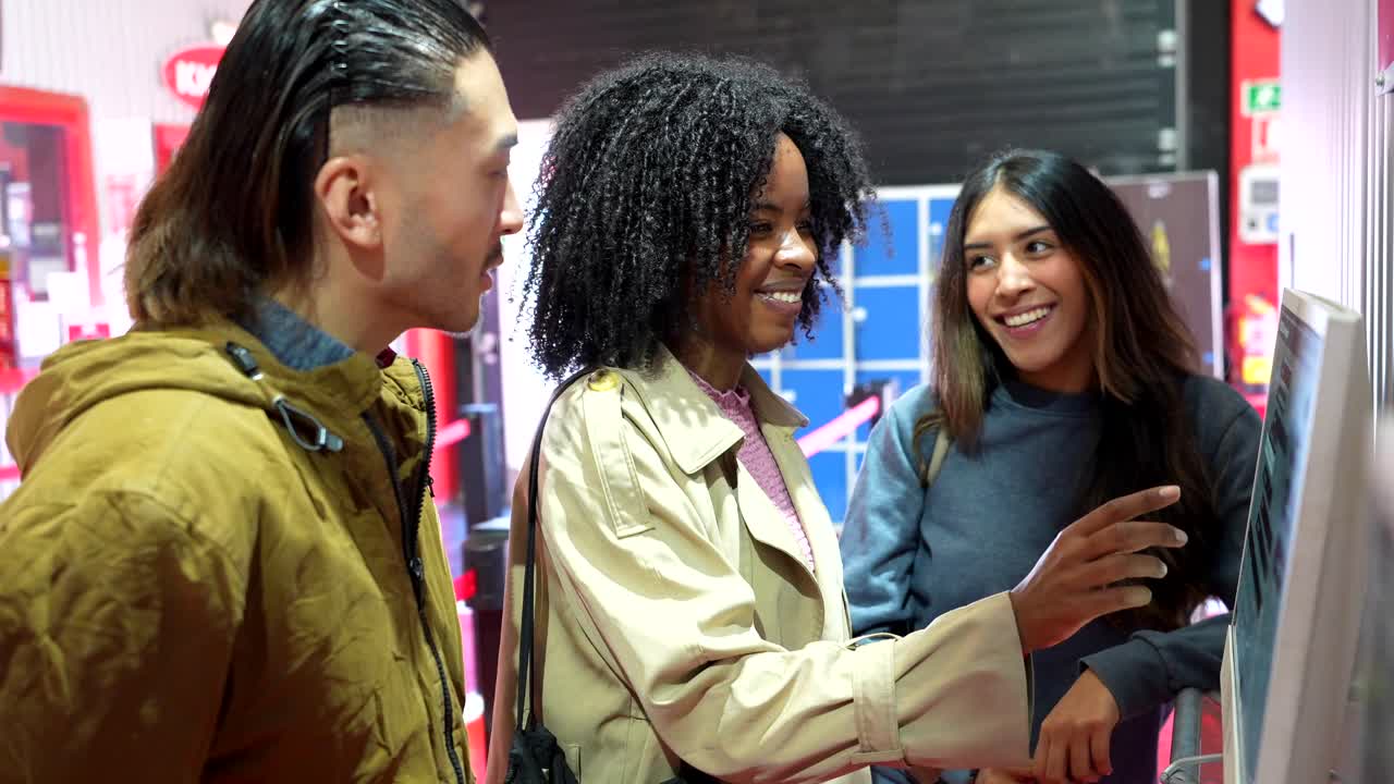 Diverse Group of Friends Interacting with a Digital Kiosk