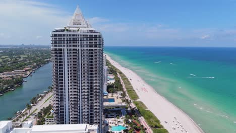 drone establisher blue and green diamond condominium skyscraper at miami beach