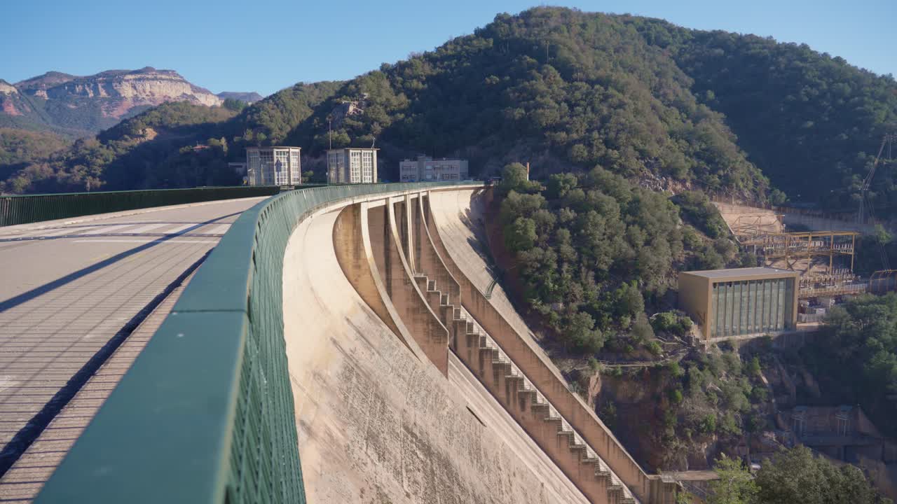 Hydroelectric dam Floodgate with flowing water through gate