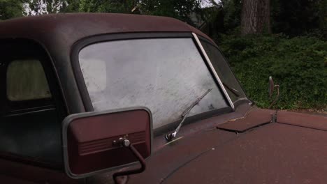 A-rusty-old-car-rests-on-the-street