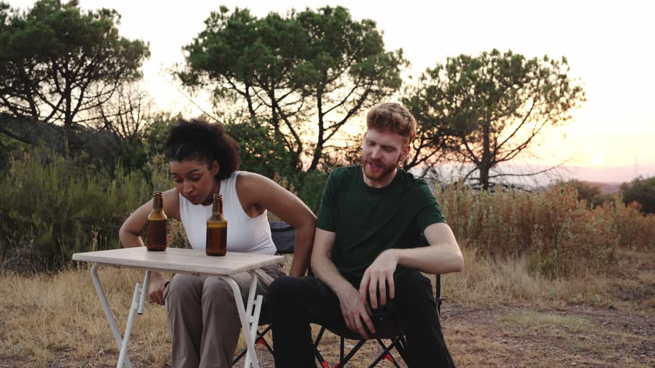 People enjoying beers outdoors