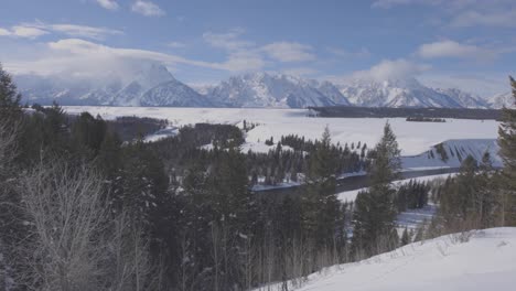 Handheld-panning-shot-of-the-Teton-range-with-the-Snake-River-in-the-foreground