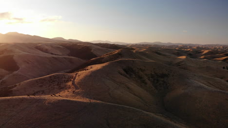 4K-Drone-shot-over-mountains-or-dunes-in-New-Zealand-during-sunset