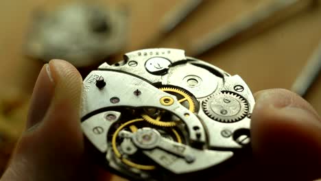 mechanical watch repair process, close up