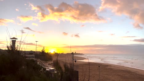 mesmerizing sunrise behind saint julian castle in carcavelos—a breathtaking view of morning tranquility and coastal charm