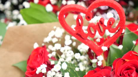 red rose bouquet and heart shape symbol for gift