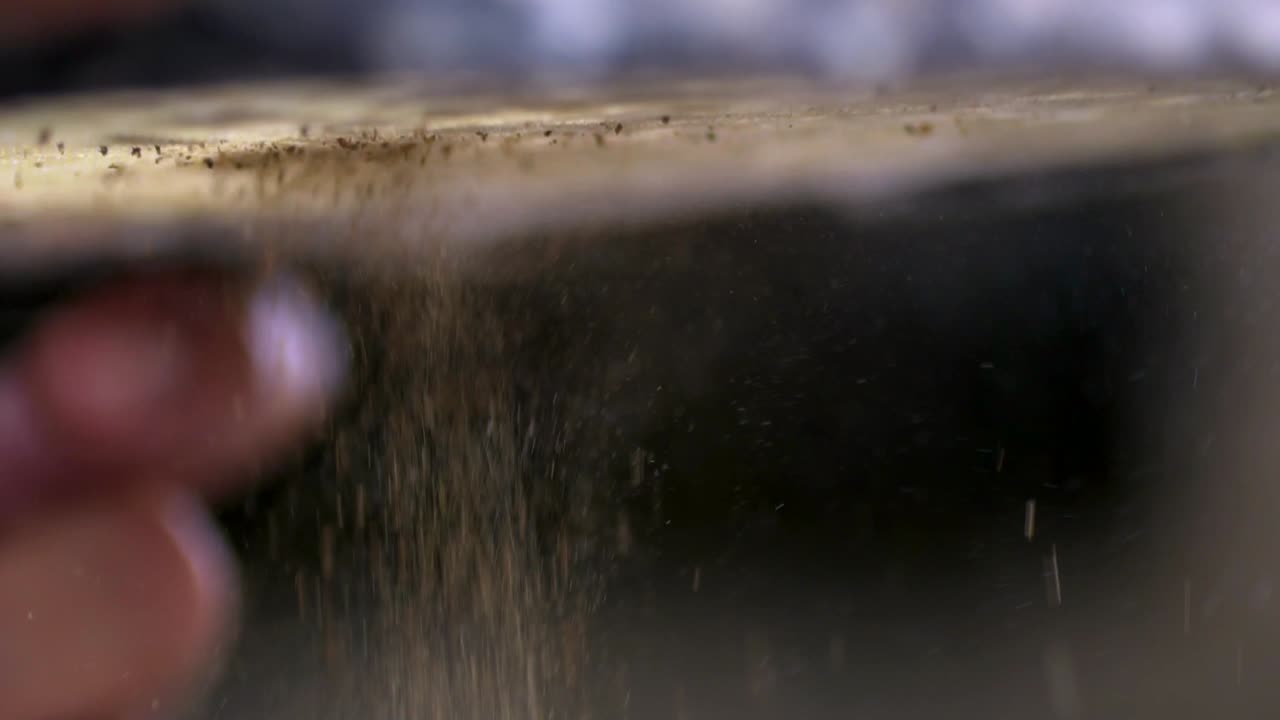 Macro Shot Of Manufacturing Process Of Madder Powder, Made From Natural Plant Roots