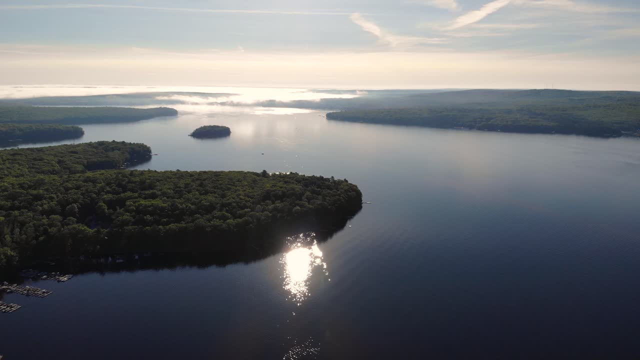 Beautiful view of Lake Wallenpaupack Pennsylvania in the morning looking out across tranquil water and forest