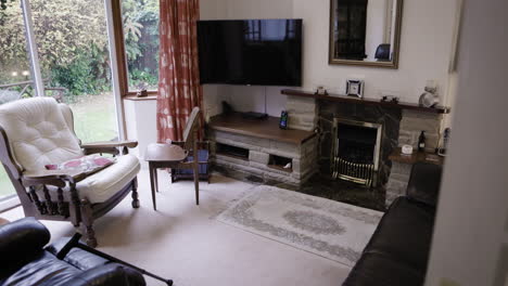 cozy living room with fireplace and armchair
