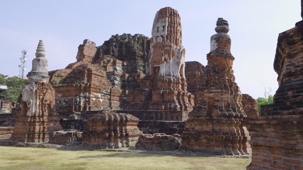 Slow motion cinematic sideways slider over stone ruins at buddhist temple in Japan