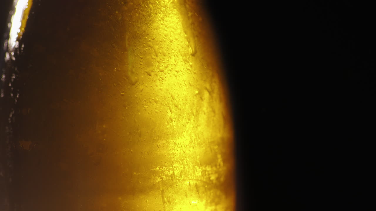 Bottle With A Cold Drink Thin Layer Of Ice On The Glass Surface