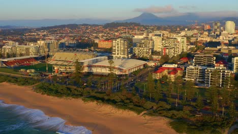 win stadium and cityscape at the oceanfront of wollongong city beach in illawarra region, nsw, australia