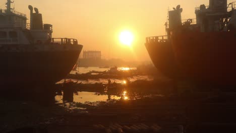 amazing sunset in buriganga river where two ships are facing each other