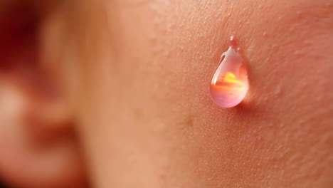 close-up of a drop on human skin