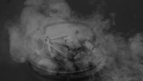 cenicero y humo
