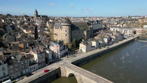 laval castle and old bridge, mayenne department, france