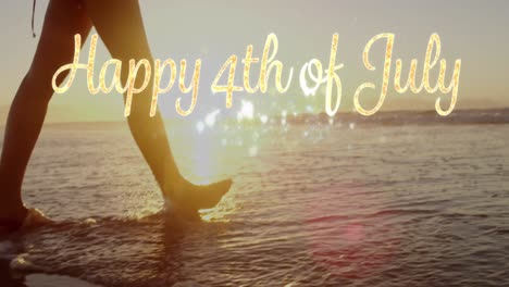 happy 4th of july greeting and a woman walking by the beach 4k