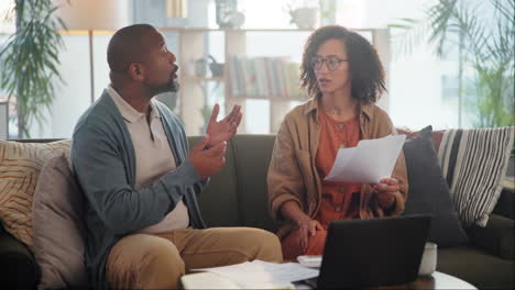 couple discussing finances at home