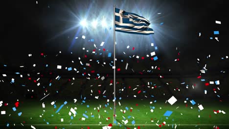 animation of multicolored confetti over flag of greece waving on pole against lights in stadium