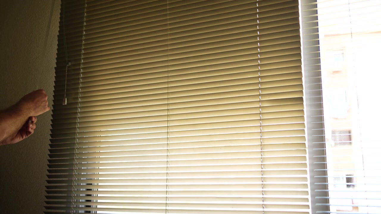 Adjusting window blinds for optimal light control and enhanced indoor comfort and privacy