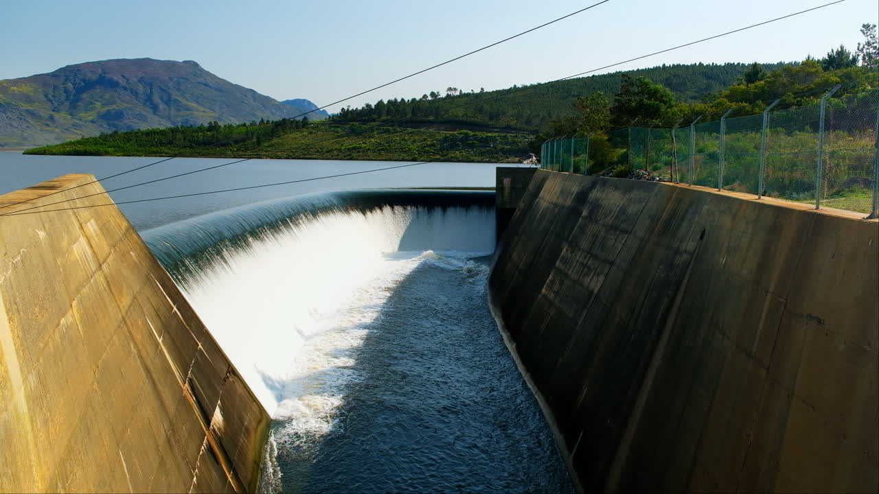 Theewaterskloof dam spillway with overflow water released to control flooding