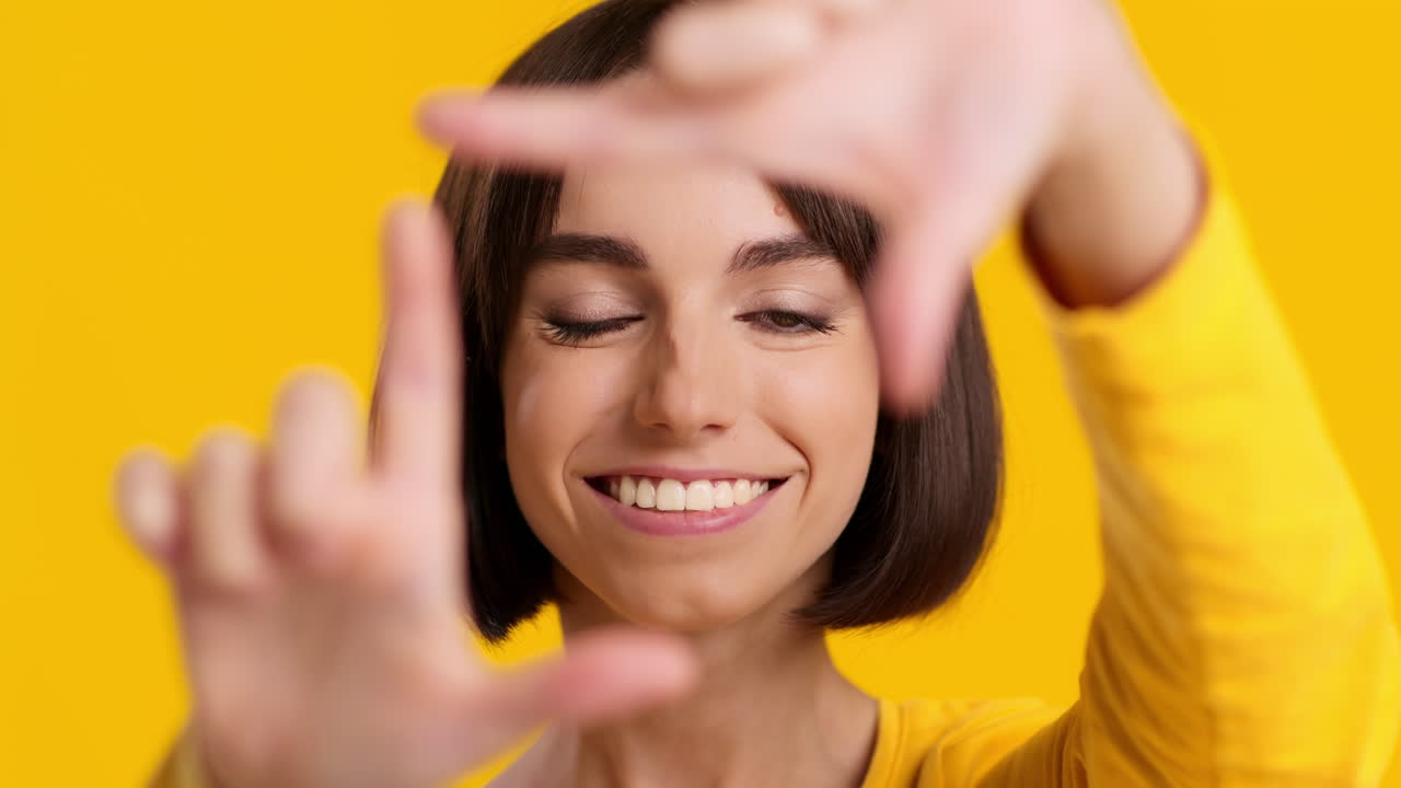 Woman Framing Her Face with Hands