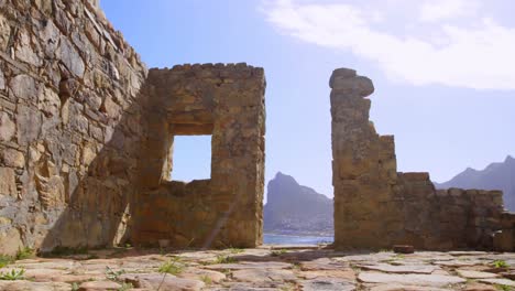 ruined stonewall on a sunny day 4k