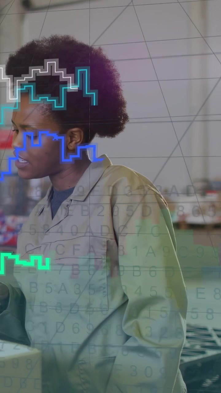 Vertical video: Warehouse tech tapping panel, activating charts over torso while checking status