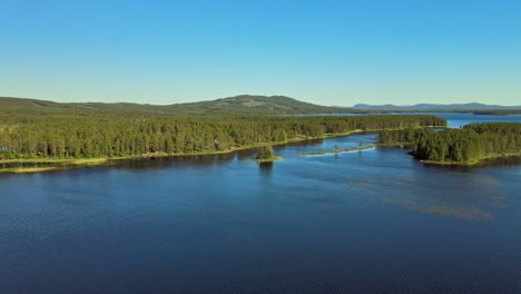 beautiful forest lake and river of vansbro municipality, dalarna county, sweden