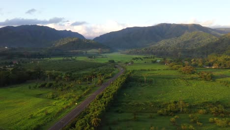 Jungle-Mountain-Road-Valley-Sunrise-Car-Driving-Aerial-Shot