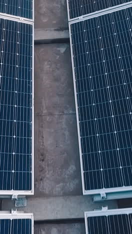 aerial view of solar energy on rooftop. top down view of solar panels mounted on roof