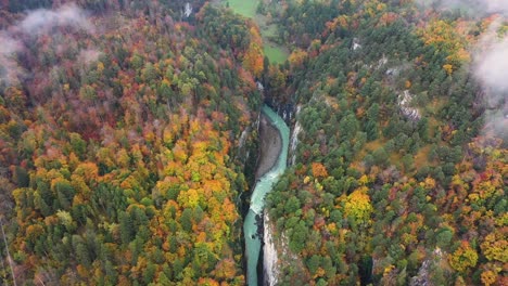 beautiful blue canyon river in autumn forest, top view