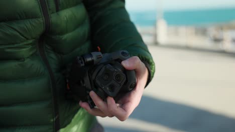 wide angle lens attachment being placed on drone