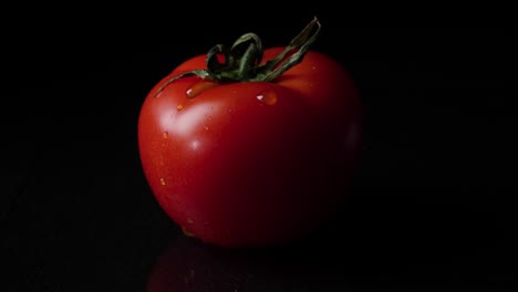 single, red tomato