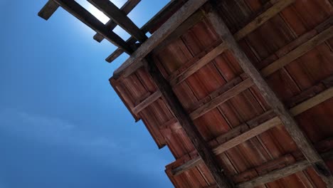broken missing tiles of house roof, poor developing country accomodation way of life poverty