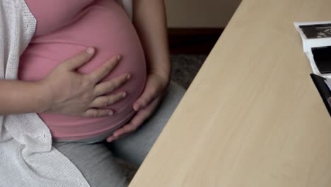 pregnant woman and gynecologist doctor at hospital