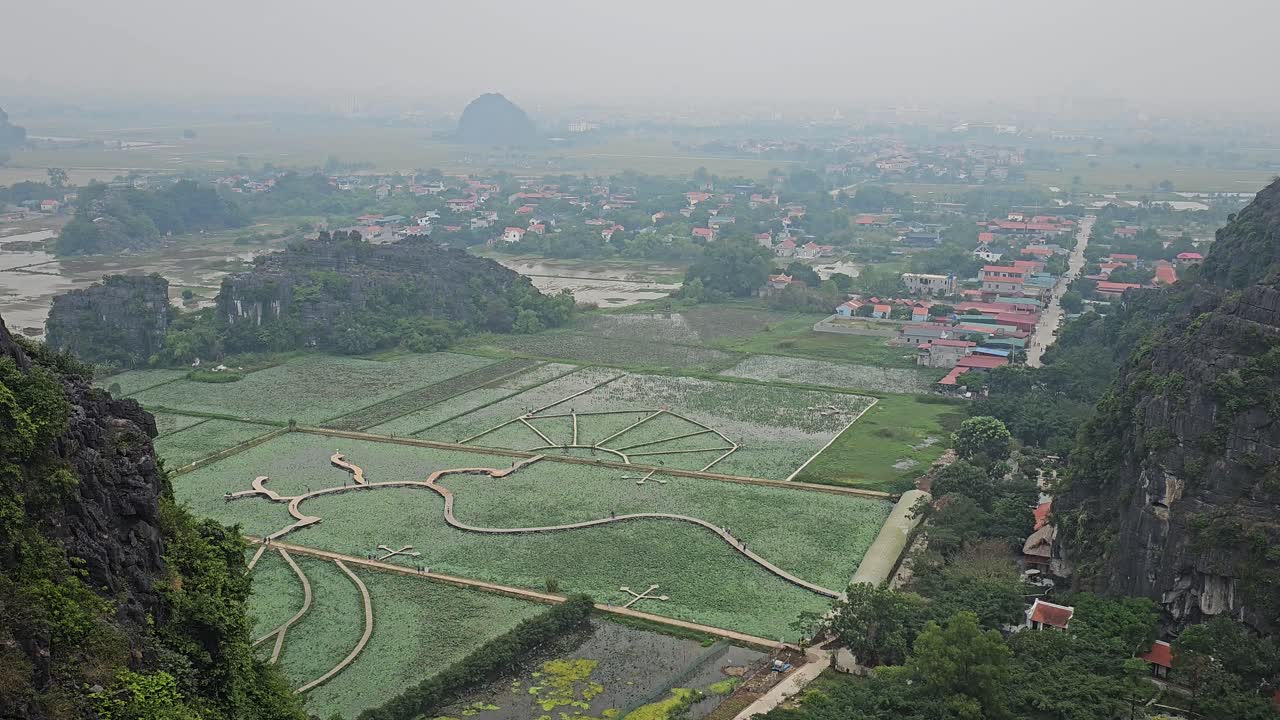 Viewpoint Dam Sen Hang Mua And Paddy Field From Lying Dragon Mountain In Vietnam. - zoom out shot