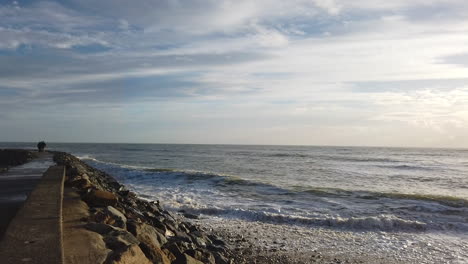 walk along the sea, cloudy