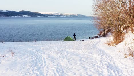 camper admiring beautiful quiet scenery in indre fosen, norway - aerial shot