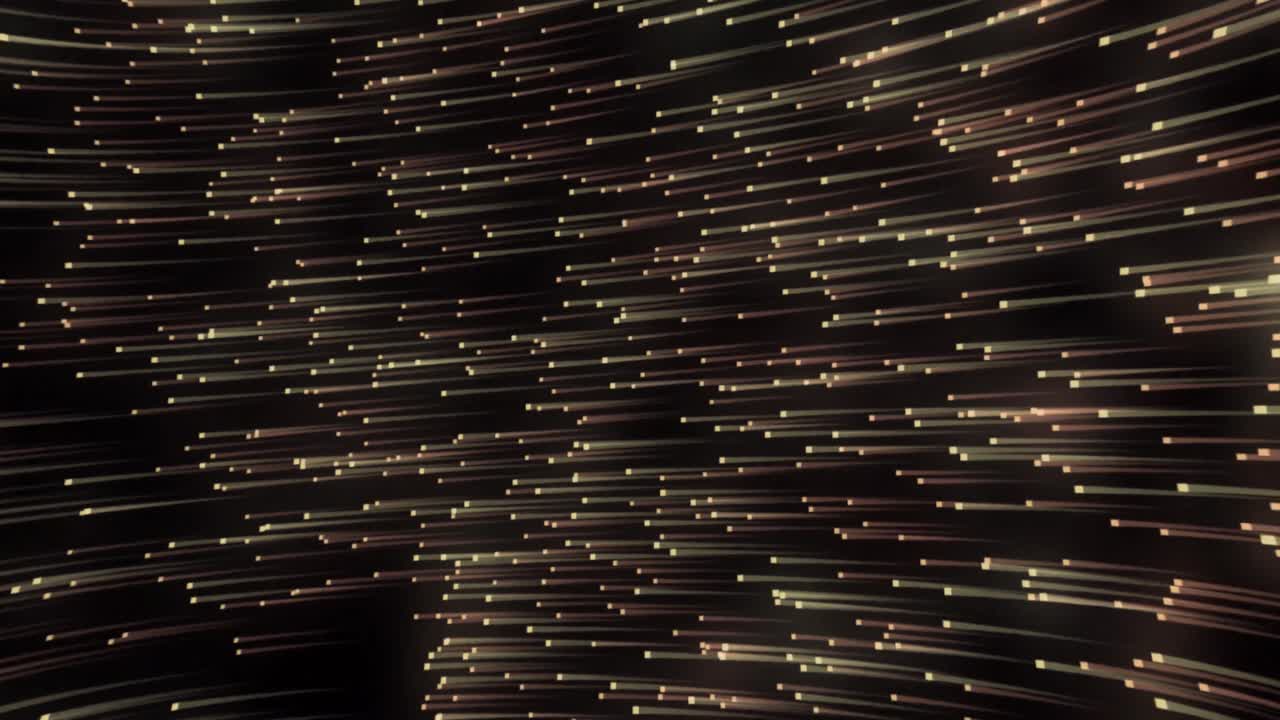 animación de puntos móviles amarillos y rosados con rastros de luz sobre fondo negro