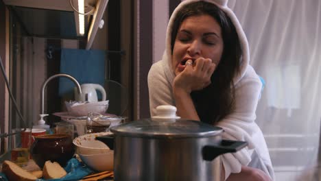 woman cooking in pajamas