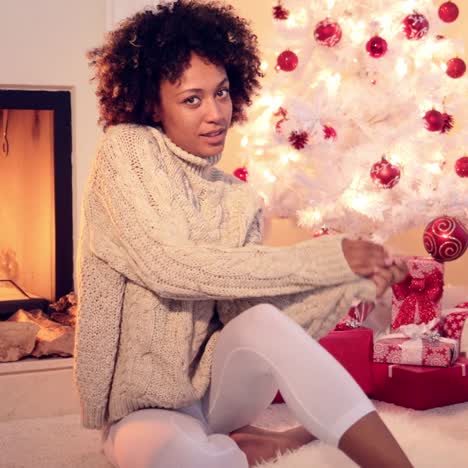 lovely black woman in white leggings and sweater