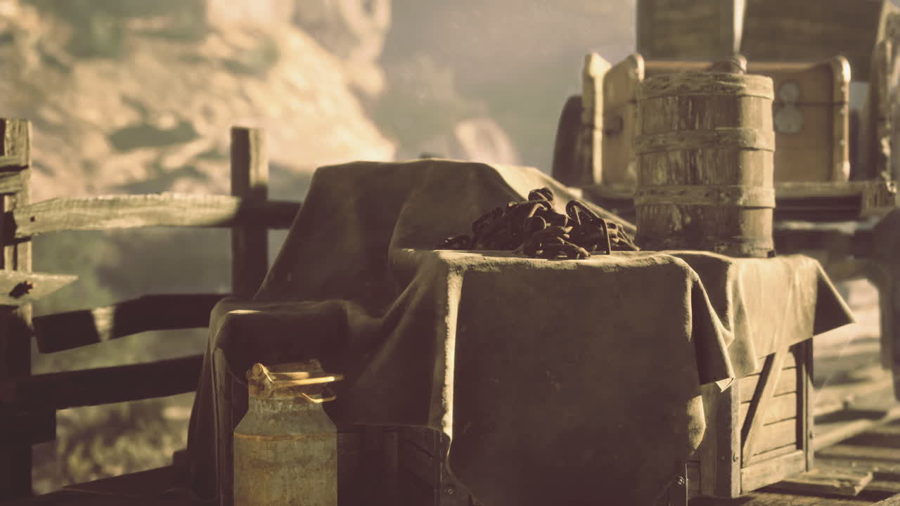 Old cart with supplies on a rustic wooden platform in daylight