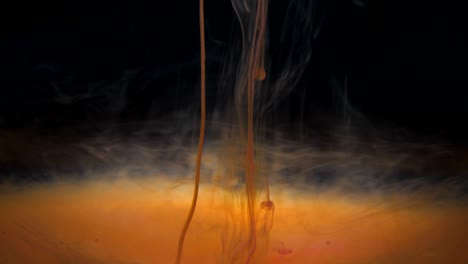 abstract red ink diffusion psychedelic movement flow. acrylic paint. fantastic hypnotic surface. abstract paint metamorphosis structured. ink swirling underwater. cloud of paint on black background.